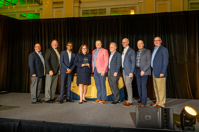 From left to right: Chris Zulfer (Director, GFD Merchandising, SpartanNash), Dennis Sievers (Customer Business Manager, Conagra) Arpen Shah (VP, Merchandising Strategy and Analytics, SpartanNash), Kelly Corty (VP, Sales, Conagra), Adam Brown (Sales Director, Conagra), Tony Sarsam (CEO, SpartanNash), Bennett Morgan (SVP and Chief Merchandising Officer, SpartanNash), Brandon Pasch (VP, Center Store Merchandising, SpartanNash), Mike Richardson (Director, GFD Merchandising, SpartanNash)