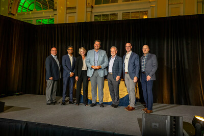 From left to right: Chris Zulfer (Director, GFD Merchandising, SpartanNash), Arpen Shah (VP, Merchandising Strategy and Analytics, SpartanNash), Tabatha Bell (Senior Director of Sales, Hometown Foods Company), Anthony Raucci (President of Sales, Hometown Foods Company), Tony Sarsam (CEO, SpartanNash), Bennett Morgan (SVP and Chief Merchandising Officer, SpartanNash), Brandon Pasch (VP, Center Store Merchandising, SpartanNash)